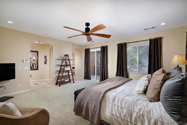 carpeted bedroom with ceiling fan