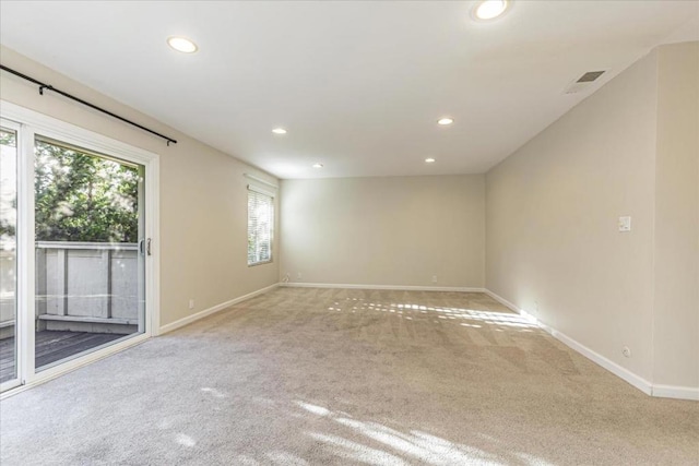 view of carpeted spare room