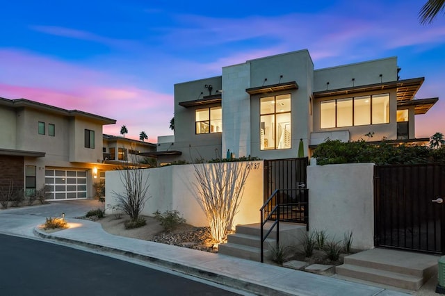 view of front of property with a garage