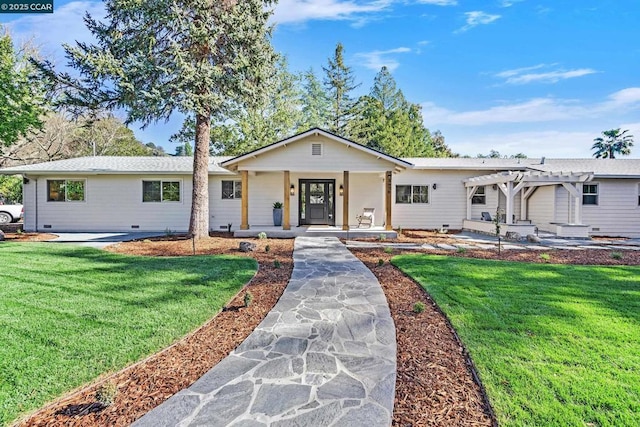 ranch-style house featuring a front lawn and a pergola