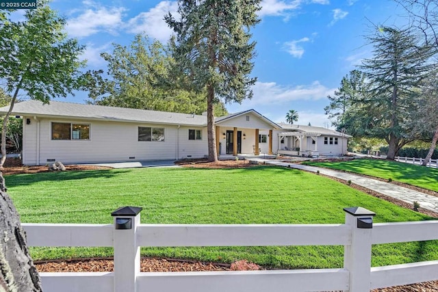 view of front of home with a porch and a front yard