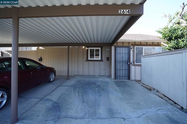 exterior space featuring a carport