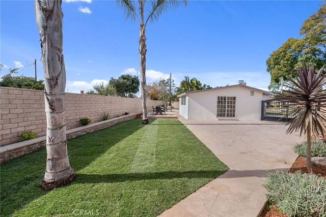 view of yard with a patio area