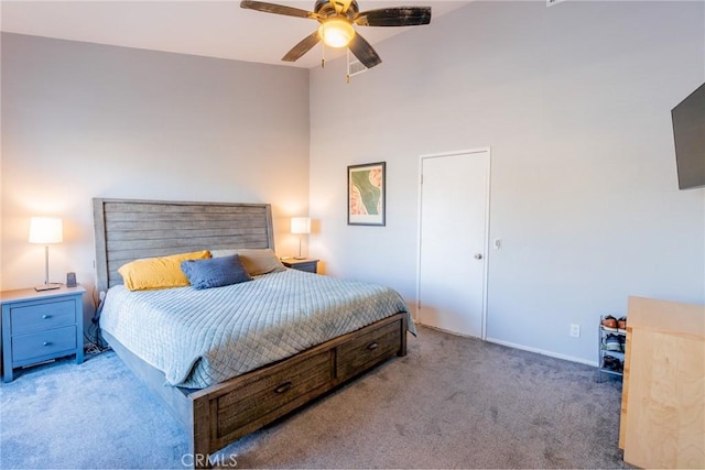 bedroom with light carpet and ceiling fan