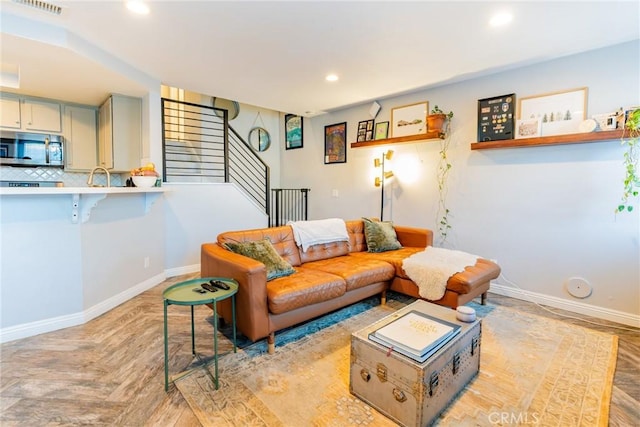 living room with light parquet floors