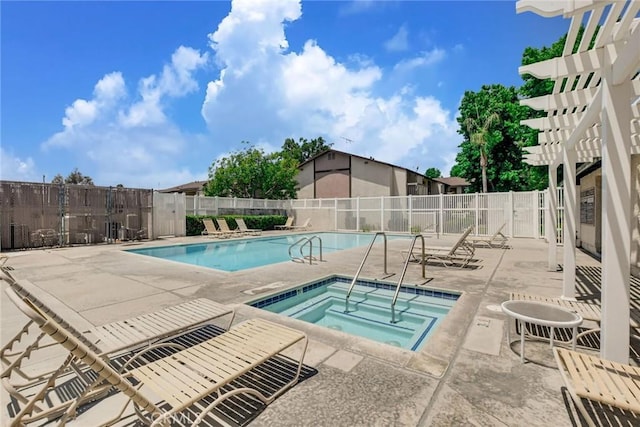 view of swimming pool with a community hot tub and a patio