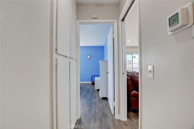 hallway featuring hardwood / wood-style floors