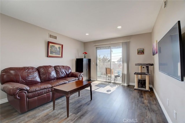 living room featuring dark hardwood / wood-style floors