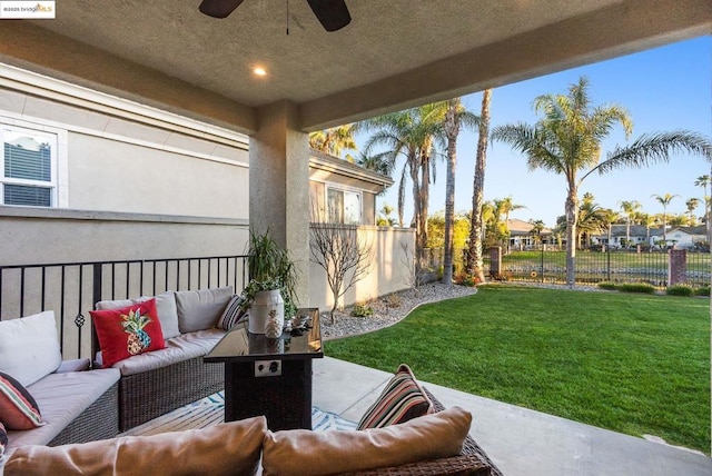 exterior space with an outdoor hangout area and ceiling fan