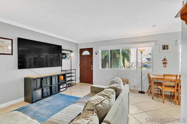 living room with crown molding and light tile patterned floors