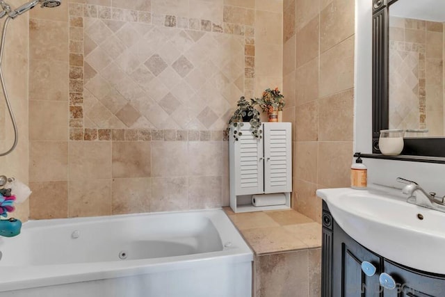 bathroom featuring vanity, shower / washtub combination, and tile walls