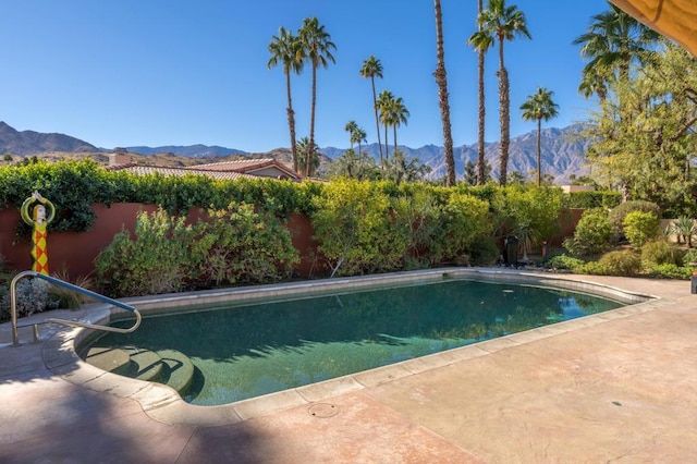 view of pool featuring a mountain view