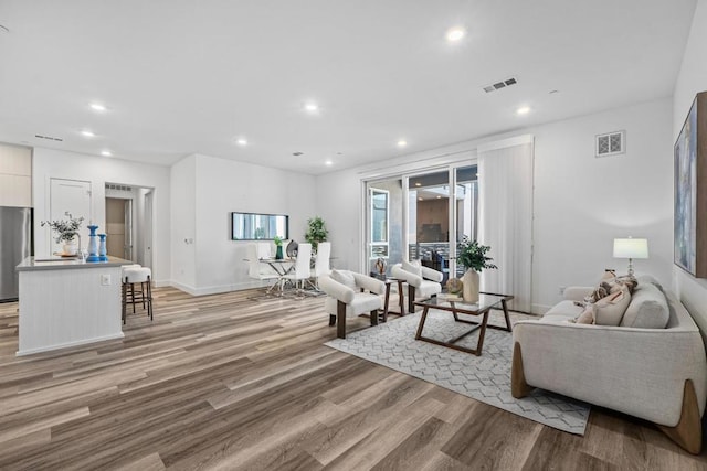 living room featuring light hardwood / wood-style floors