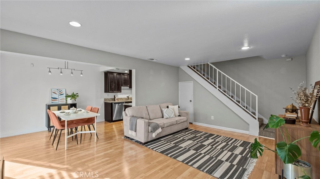 living room with light hardwood / wood-style floors