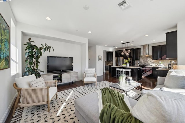 living room featuring dark hardwood / wood-style floors