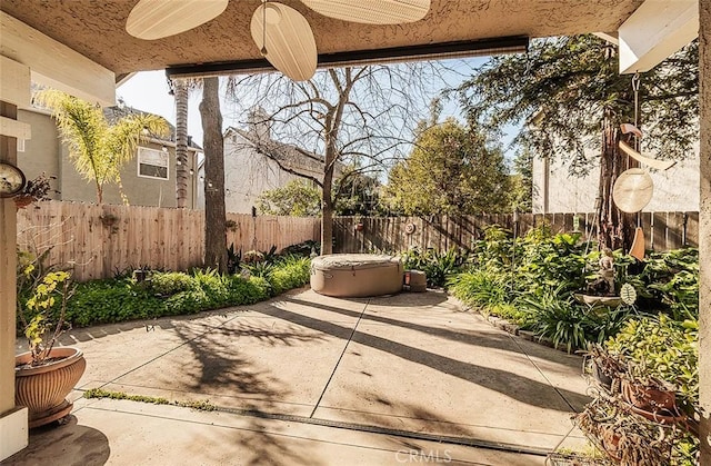 view of patio with ceiling fan