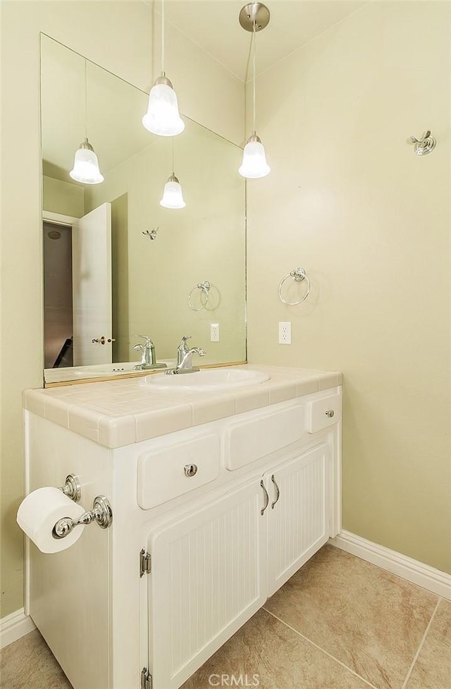 bathroom with vanity and tile patterned floors