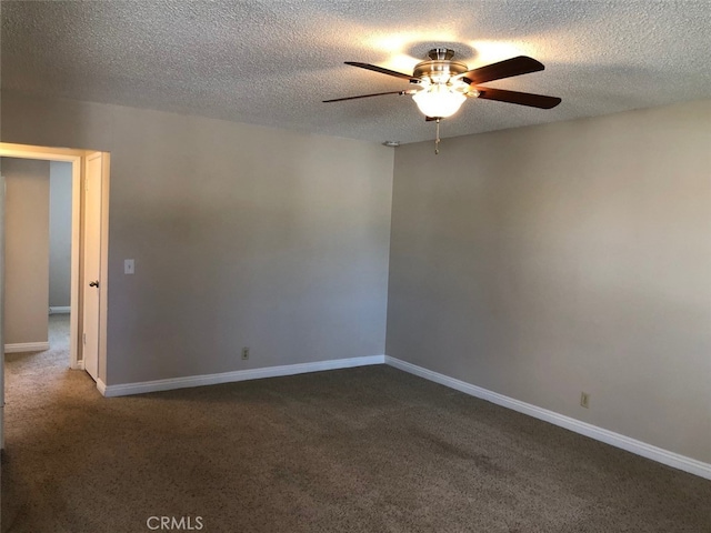 carpeted empty room featuring a textured ceiling and ceiling fan