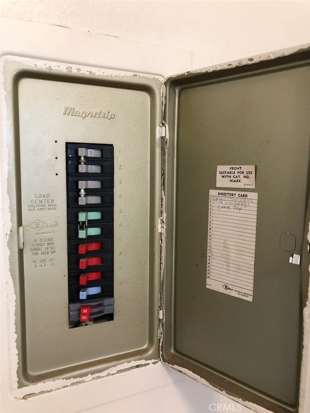 utility room featuring electric panel