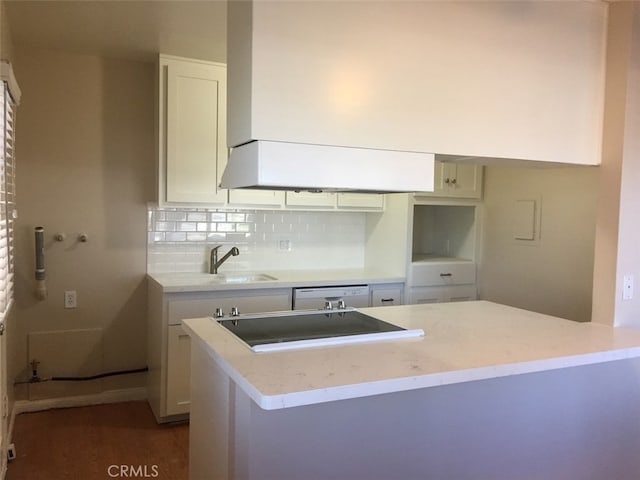 kitchen featuring white cabinets, decorative backsplash, kitchen peninsula, and dishwasher