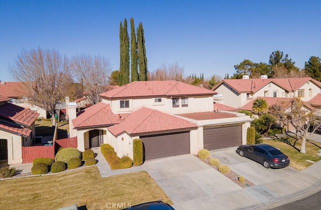 mediterranean / spanish-style house with a front lawn