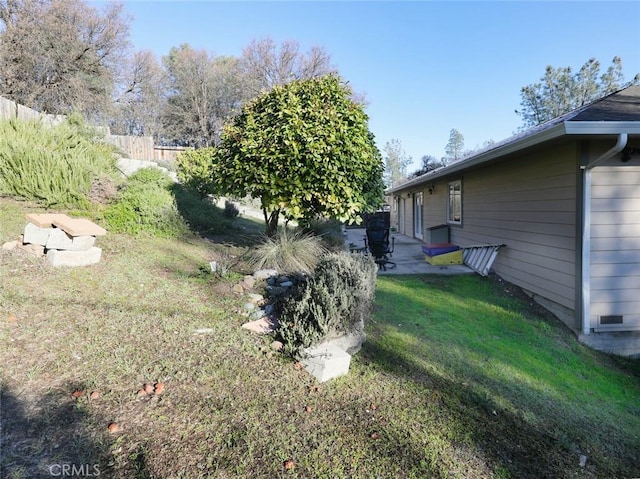 view of yard with a patio area and fence