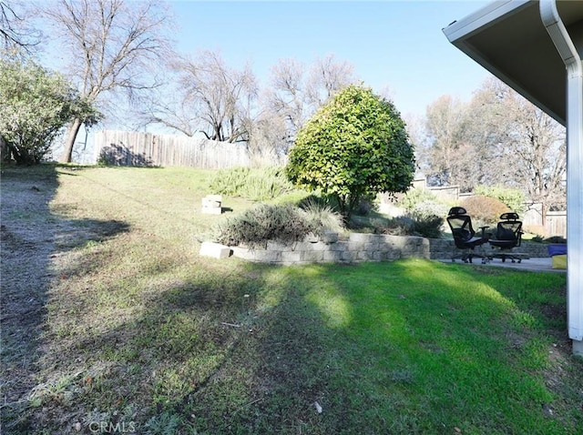 view of yard with fence