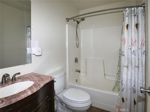 full bath featuring shower / bath combo, vanity, and toilet