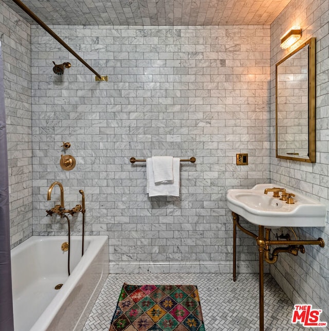 bathroom with tile patterned flooring and sink