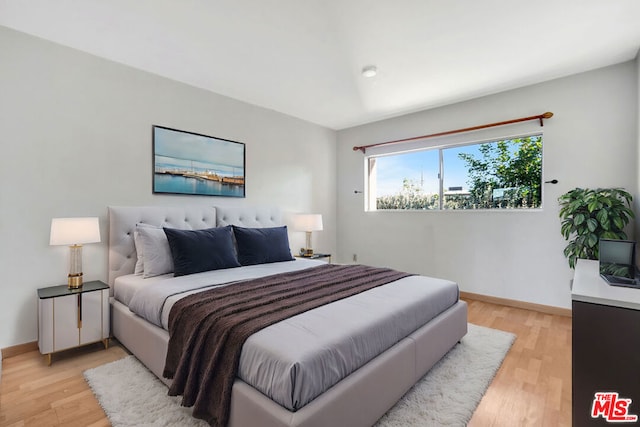 bedroom featuring light hardwood / wood-style flooring