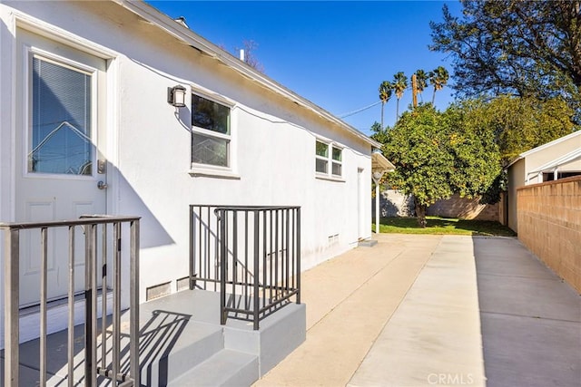 view of home's exterior with a patio area