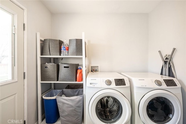 laundry area featuring washing machine and dryer