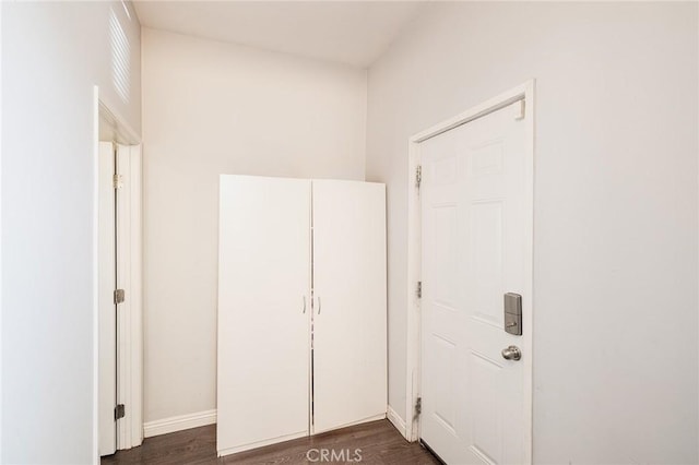 interior space with dark wood-type flooring