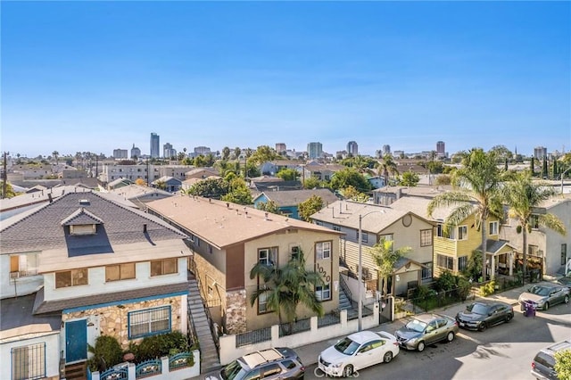 birds eye view of property with a city view