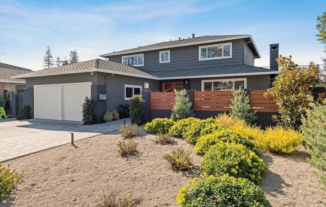 view of front of property with a garage