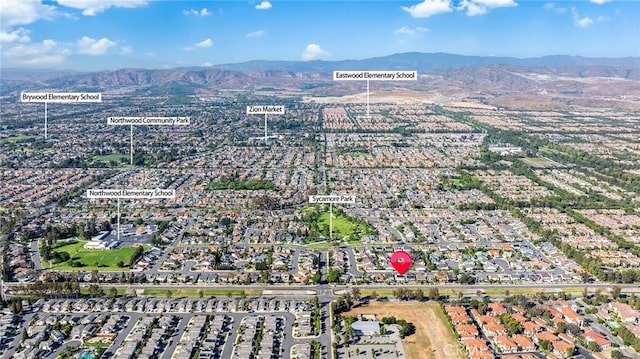 bird's eye view with a mountain view