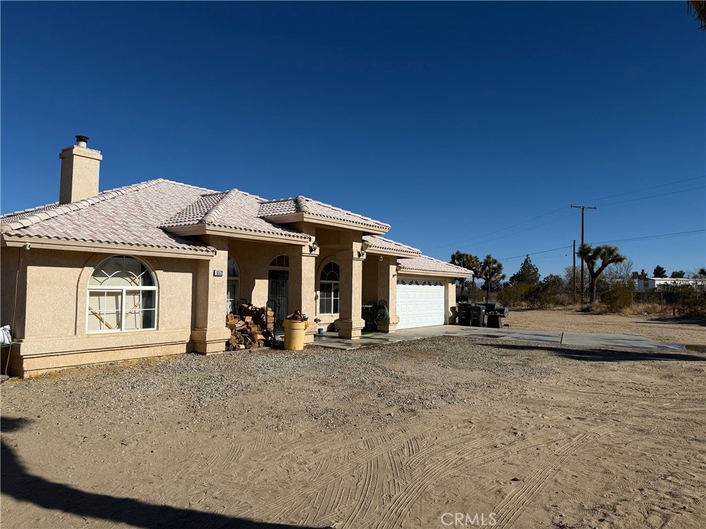 view of front of property featuring a garage