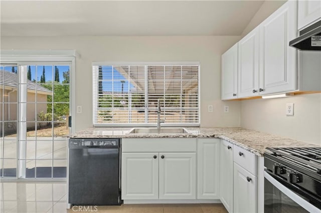 kitchen featuring white cabinetry, light tile patterned flooring, sink, and black appliances