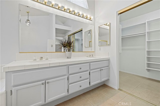 bathroom featuring vanity and tile patterned floors