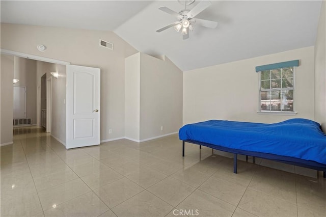 bedroom featuring ceiling fan, vaulted ceiling, and light tile patterned floors