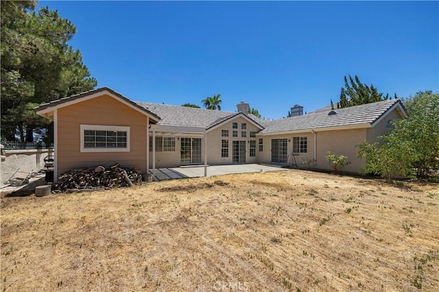 rear view of property with a patio