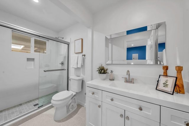 bathroom with beamed ceiling, vanity, an enclosed shower, and toilet