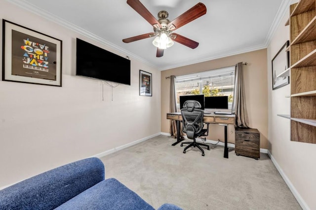 office space with crown molding, light colored carpet, and ceiling fan