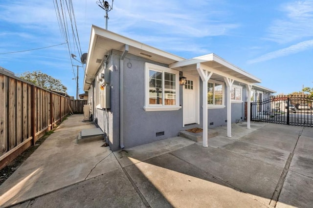 exterior space with a patio