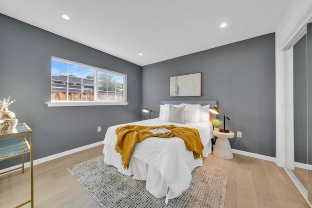 bedroom featuring light hardwood / wood-style floors