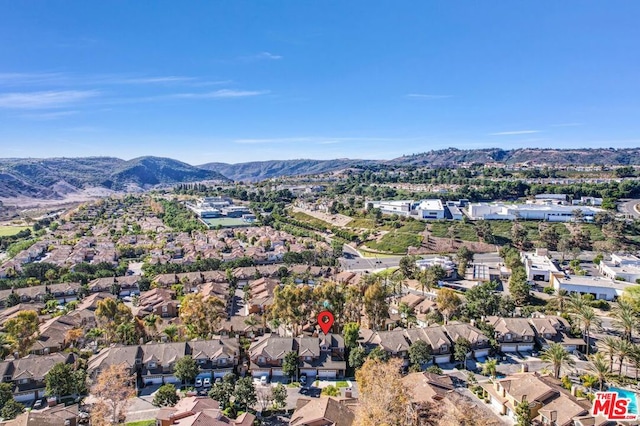 bird's eye view with a mountain view