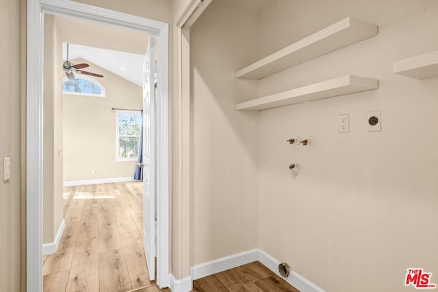 laundry room with hookup for a gas dryer, light hardwood / wood-style flooring, hookup for an electric dryer, and ceiling fan