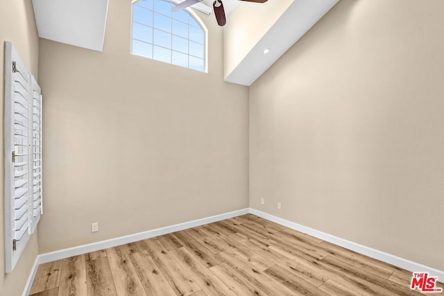 empty room with light hardwood / wood-style flooring and ceiling fan