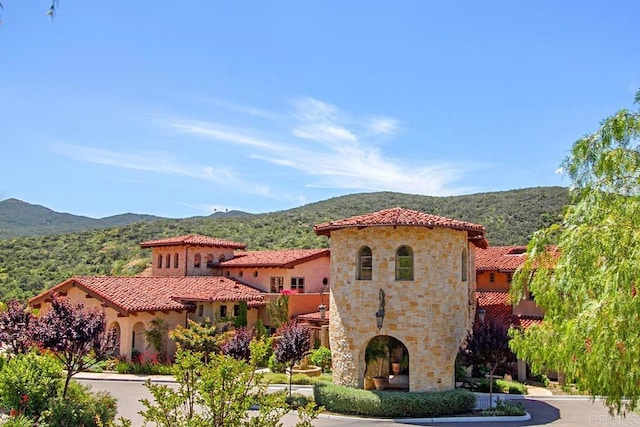 exterior space with a mountain view