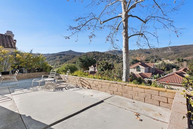 view of patio with a mountain view